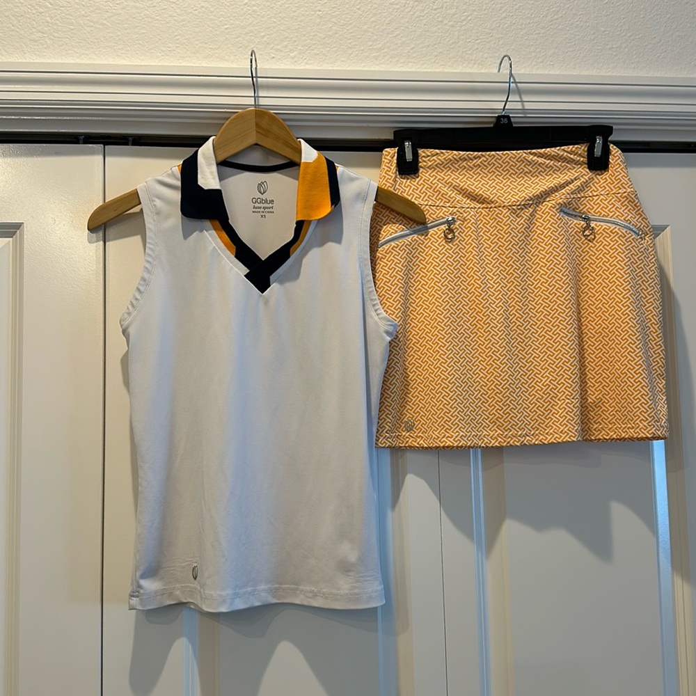 Like New!  GG Blue golf outfits.  Size XS